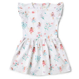 White dress with fairy and floral pattern on a white background