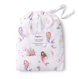 A white organic cotton cat sheet with a mermaid and sea creature print, shown inside its matching white drawstring storage bag. The bag features a white label that reads 'Simply Happy Organic Cat Sheet'.