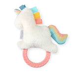 White plush toy with colorful accents and a pink rattle on a white background