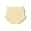 Yellow baby bloomers with ruffled edges on a white background