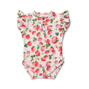 Baby onesie with strawberry pattern on a white background