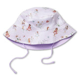A light lavender bucket hat with a whimsical print of fairies and flowers, featuring a matching lavender chin strap and a small gold '96' brand tag on the side.