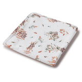 Floral patterned fabric with animals on a white background