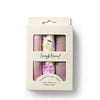 Pack of organic muslin cloths with floral patterns in a 'Snuggle Hunny' branded box on a white background.