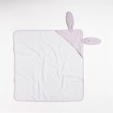 Baby comfort blanket with bunny ears on a light gray background