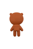 Brown teddy bear-shaped object on a white background
