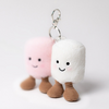 Two plush keychains shaped like marshmallows with smiling faces on a white background