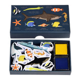 Set of ocean-themed magnets in a box with colorful illustrations on a white background