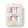 Pack of organic muslin wraps with floral patterns in a Snuggle Hunny branded box.