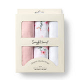 Pack of organic muslin wraps with floral patterns in a Snuggle Hunny branded box.