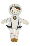 Plush toy astronaut in a white suit with a helmet on a white background