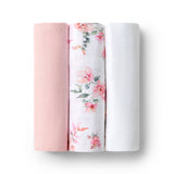 Three fabric swatches in pink, white with floral pattern, and another white color on a white background.