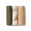 Three folded fabric swatches in green, white, and beige with bear designs on a white background