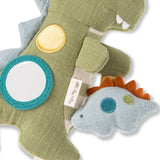 Two soft toy dinosaurs, one green and one gray with orange spikes, on a white background.