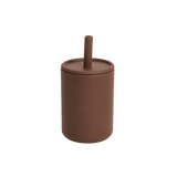 Brown cylindrical container with a lid and straw on a white background