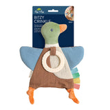 A duck-shaped baby teething toy by Desi Desi, featuring a green head, blue wings, a brown apron, and orange feet, with a cream ring and colorful tabs. It is shown with its dark blue cardboard packaging header card on a plain white background.