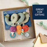 Baby rattle toy set in a box with packaging labeled 'Itzy Ritzy Spiral' on a light background.