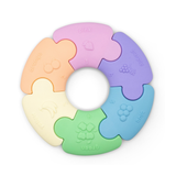 Colorful baby teether with pastel shades on a white background