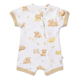 A baby short-sleeve romper in white with a cute cartoon pig print, featuring beige ribbed trim on the sleeves, leg openings, and collar, and a front zipper.