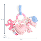 Pink and blue baby rattle with measurements on a white background