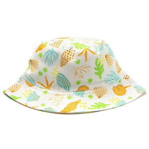 Bucket hat with beach-themed pattern on a white background