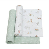 Three rolled-up fabric swatches with animal prints on a white background