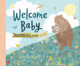 Book cover with a bear holding a baby, surrounded by nature and text 'Welcome Baby to this world' by Jess Racklyeft.