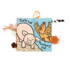 Children's soft book with farm animal illustrations on a white background