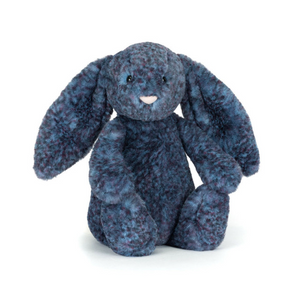 Blue plush bunny toy on a white background