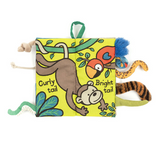 Children's soft book with animal illustrations on a white background