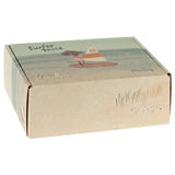 A square kraft paper gift box featuring a vintage-style illustration of a surfer on a beach with the text 'Surfer Trice' and 'Morley' on a white background.