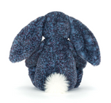 Blue textured plush bunny toy on a white background