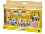Sylvanian Families toy set packaging with figures and furniture on a white background