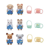Set of toy animal figures with matching bags on a white background