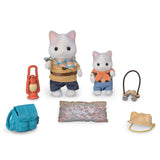 Set of toy figures and accessories on a white background