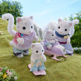 Set of white cat plush toys with accessories on a grassy background