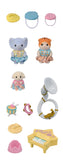 Set of small figurines with accessories on a white background
