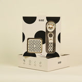 BIBS product packaging with black and white design on a beige background